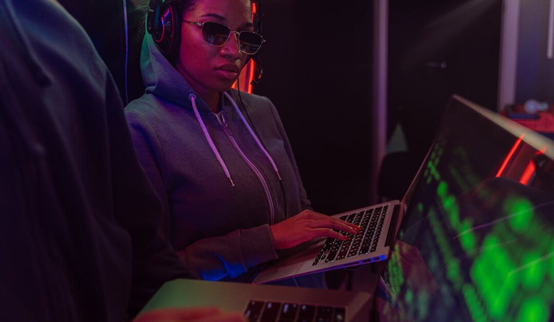 A tech-savvy adult using a laptop at night with neon lighting, creating a cyberpunk ambiance.