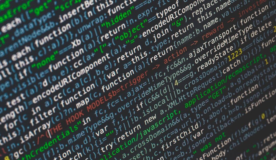 Close-up of colorful programming code displayed on a computer screen.